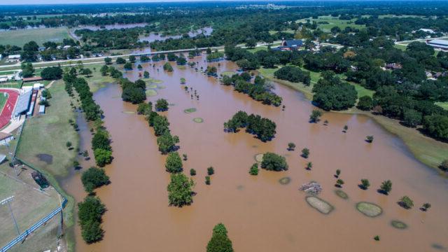 Large-scale flooding in an urban area of the United States submerges streets and impacts infrastructure